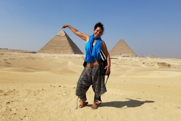 A person Posing at The Pyramids of Giza in Cairo