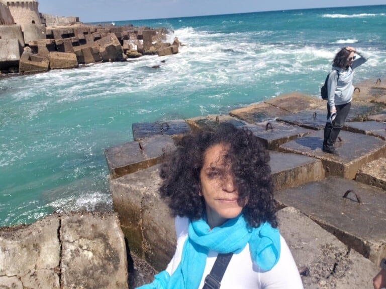 Two person posing at the back of Qaibait Fortress in Alexandria, Egypt