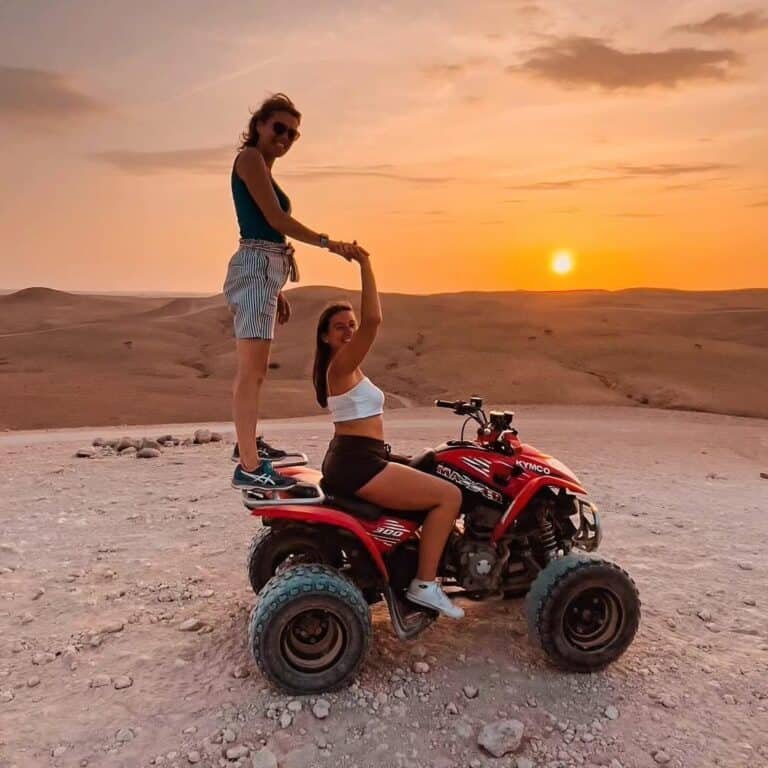 Two ladies enjoying an agafay desert quad bike ride