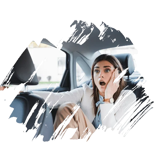 confused woman inside a car