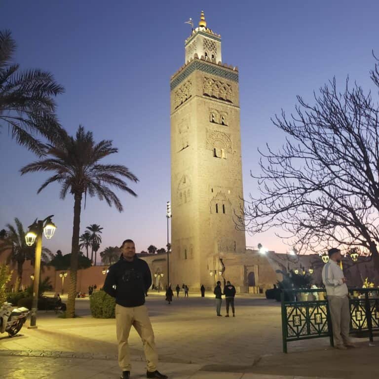 A person posing at The Koutoubia Mosque in Marrakech