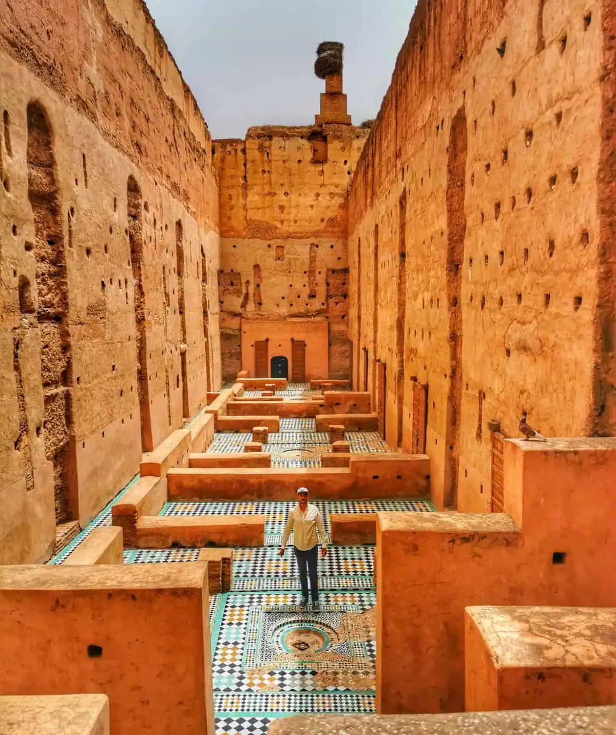 A man posing at El Baadi Palace Marrakesh
