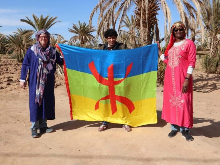 Tourist with local guide at Marrakech Palmeraie, Morocco