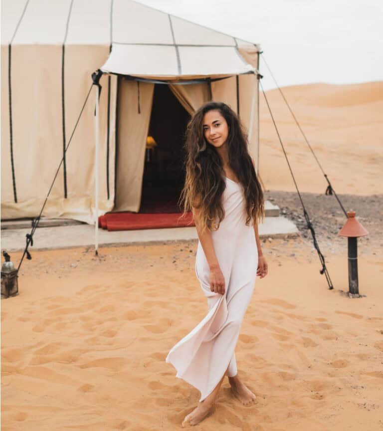 A woman posing Agafay Desert tent